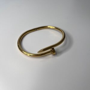 Pulsera clavo dorado