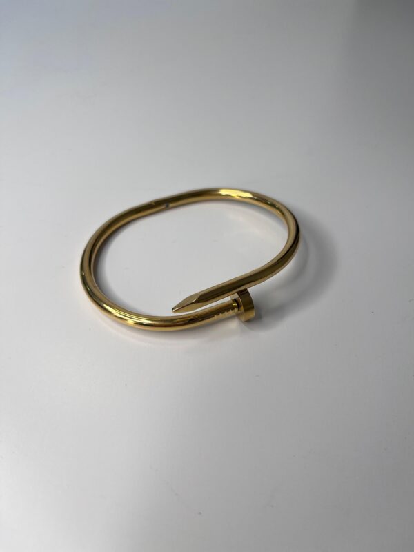 Pulsera clavo dorado